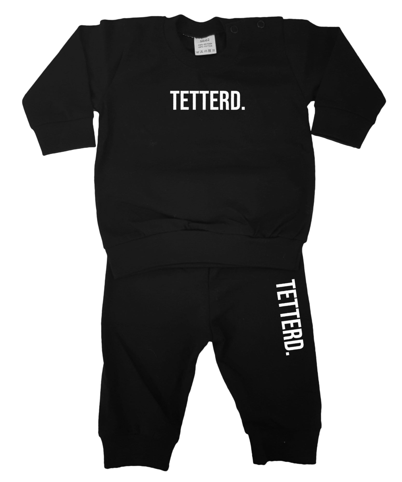 Baby pyjama in  het zwart met de tekst Tetterd in het wit